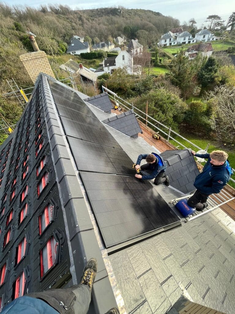 Team fitting solar panels